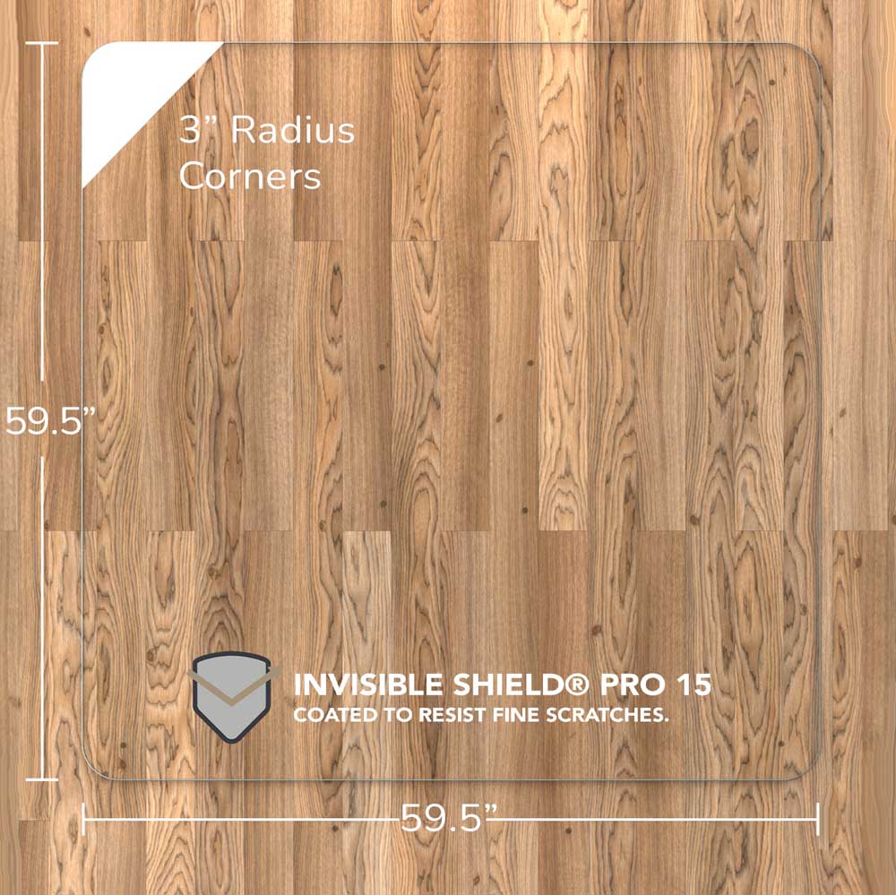 #glass clarity_luminoso (low-iron ultra clear) alt="A luminoso glass chair mat with dimensions of 60 inches by 60 inches, featuring 3-inch radius corners. The mat is labeled with "INVISIBLE SHIELD® PRO 15 COATED TO RESIST FINE SCRATCHES." and is placed on a wooden floor."