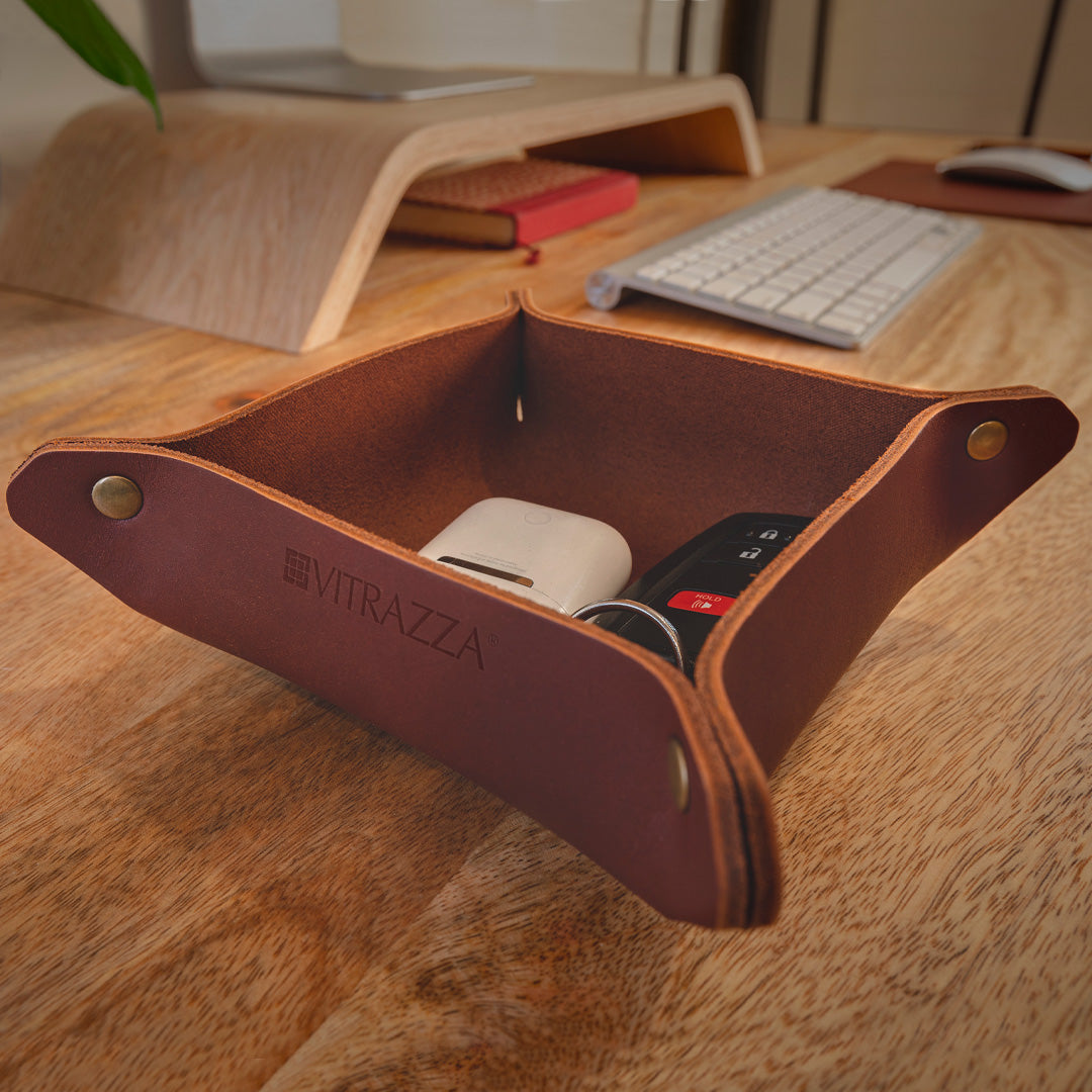 #color_mahogany A brown leather desk organizer is placed on a wooden desk.