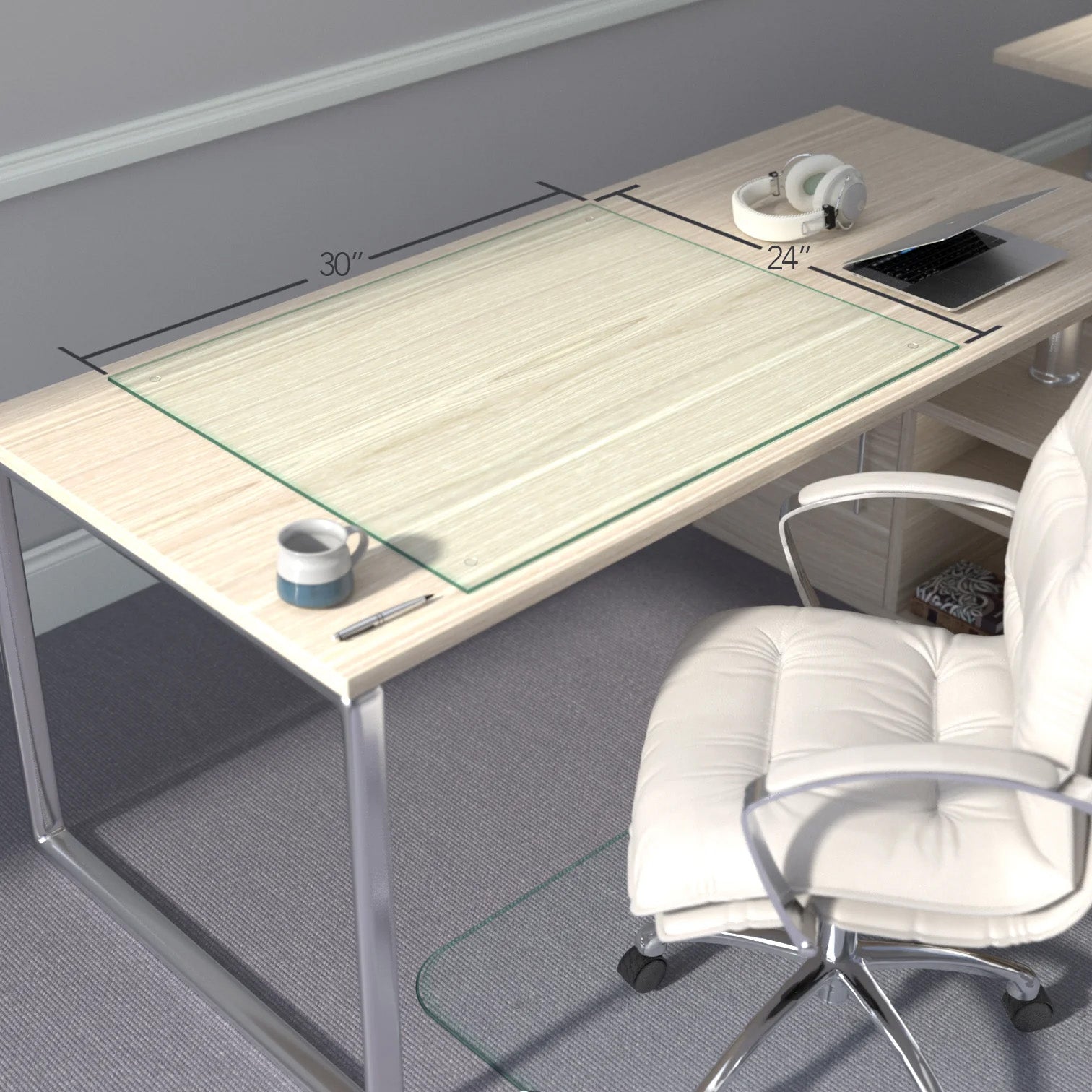 #glass clarity_chiaro (standard clear) alt="A minimalist desk setup with a light wood finish, featuring a "chiaro" glass desk blotter measuring 30 inches by 24 inches. On the desk, there is a mug, a pen, a pair of headphones, and a laptop. A white office chair is positioned in front of the desk. The room has gray carpeted flooring and light gray walls with white baseboards."