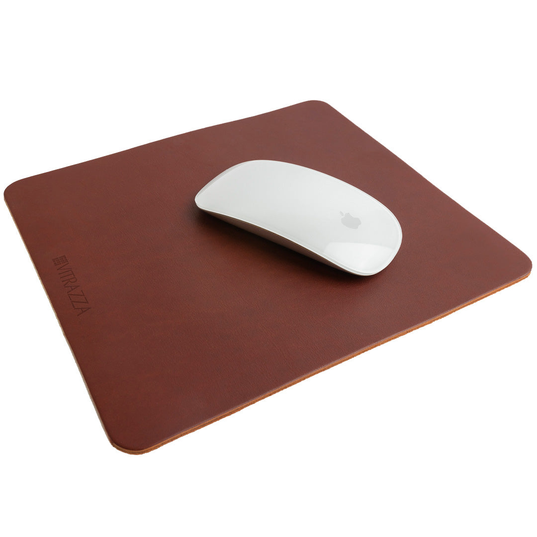 #color_mahogany alt="A white wireless mouse is placed on top of a brown leather mouse pad. The mouse pad has the brand name "VITRAZZA" on it. The background is plain white."