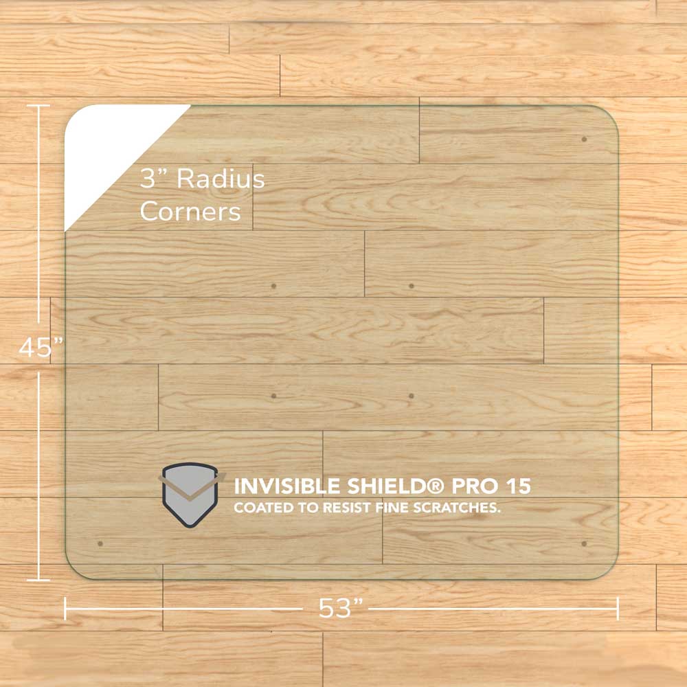 #glass clarity_chiaro (standard clear) alt="A square "chiaro" glass chair mat with dimensions of 45 inches by 53 inches, featuring 3-inch radius corners. The mat is labeled with "INVISIBLE SHIELD® PRO 15 COATED TO RESIST FINE SCRATCHES." placed on a wooden floor."