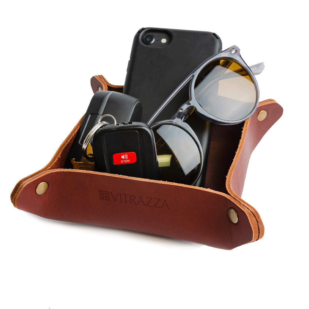 #color_mahogany alt="A brown leather desk organizer with various items inside placed against a white background.
