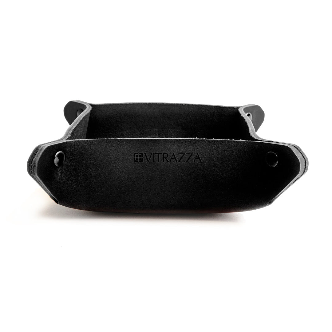 #color_charcoal alt="A black leather desk organizer. It is empty and placed against a white background. The organizer has a simple design with black rivets at the corners."