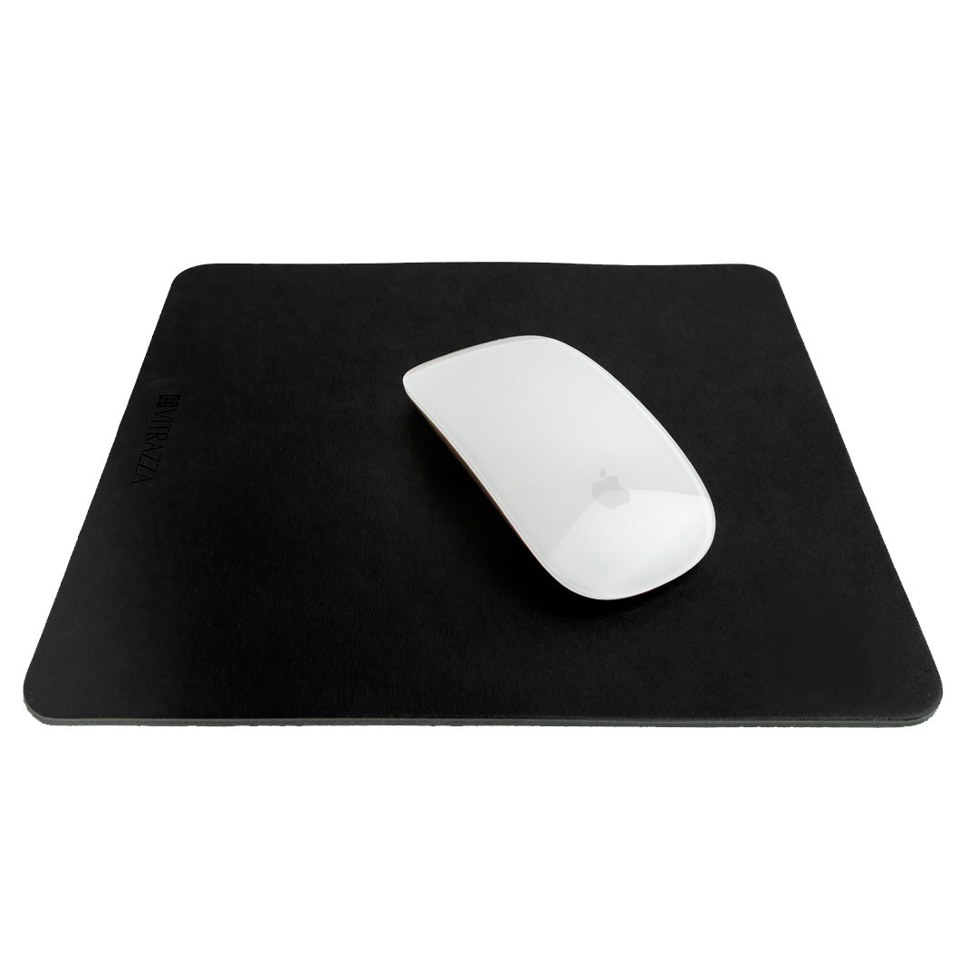 #color_charcoal alt="A white wireless mouse is placed on top of a black leather mouse pad. The mouse pad has the brand name "VITRAZZA" on it. The background is plain white."